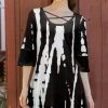Lily | Black & White Abstract Crisscross-Accent Trumpet-Sleeve Tunic - Women & Plus