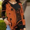 Lily | Black & Orange Abstract Floral Long-Sleeve Side-Slit V-Neck Tunic - Women